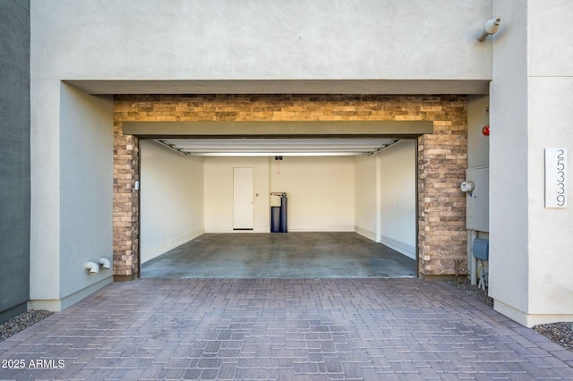 garage featuring baseboards
