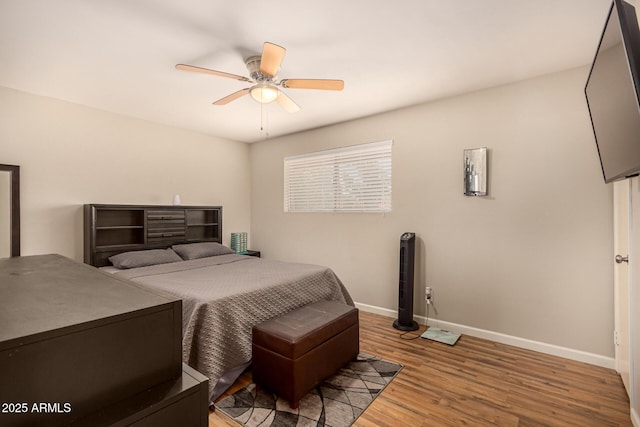 8532 E Portland St, Scottsdale, AZ 85257 - bedroom featuring wood finished floors and a ceiling fan