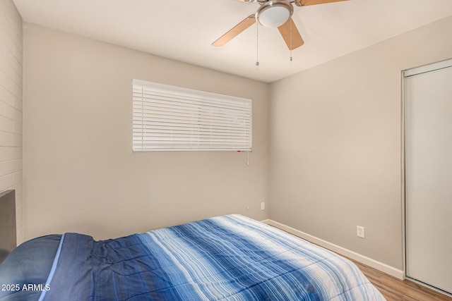 8532 E Portland St, Scottsdale, AZ 85257 - bedroom featuring wood finished floors and a ceiling fan