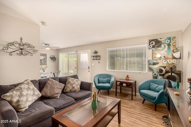 8532 E Portland St, Scottsdale, AZ 85257 - living area with light wood-style floors and ceiling fan