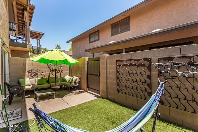 8532 E Portland St, Scottsdale, AZ 85257 - view of patio featuring outdoor lounge area and a gate