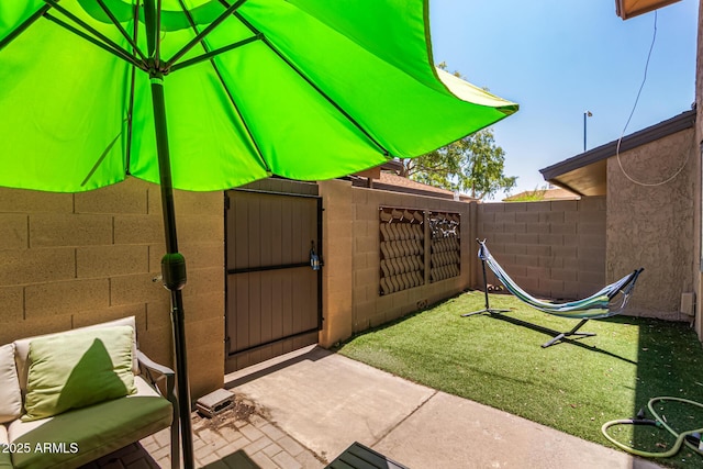 8532 E Portland St, Scottsdale, AZ 85257 - fenced backyard featuring a gate and a patio