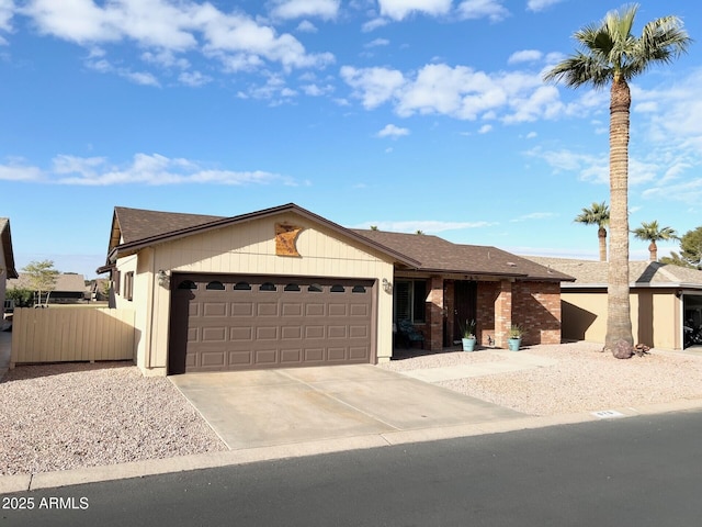 ranch-style house featuring a garage