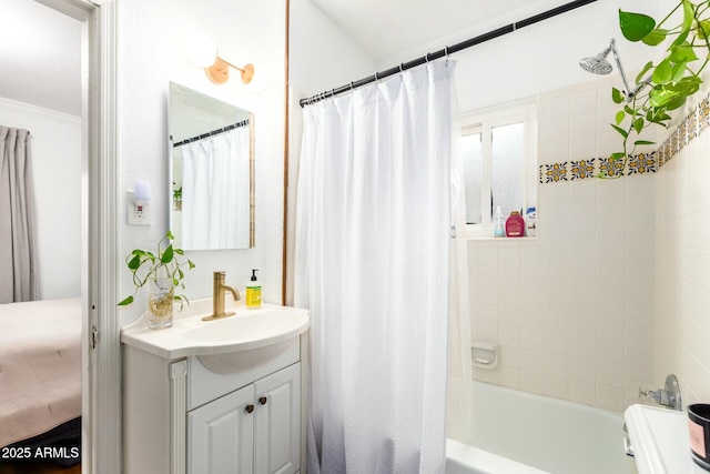 bathroom featuring vanity and shower / bath combo