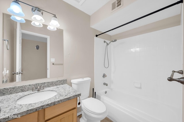 bathroom with visible vents, shower / tub combination, vanity, and toilet