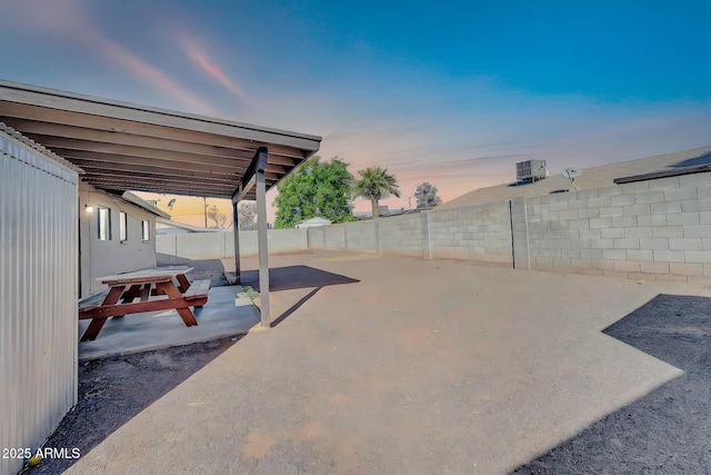 view of patio / terrace featuring central AC unit and a fenced backyard