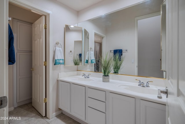 bathroom with vanity and tile patterned floors