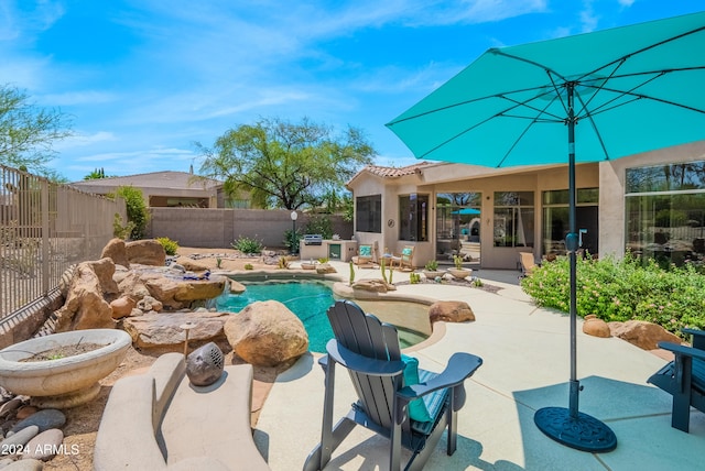 view of swimming pool featuring a patio