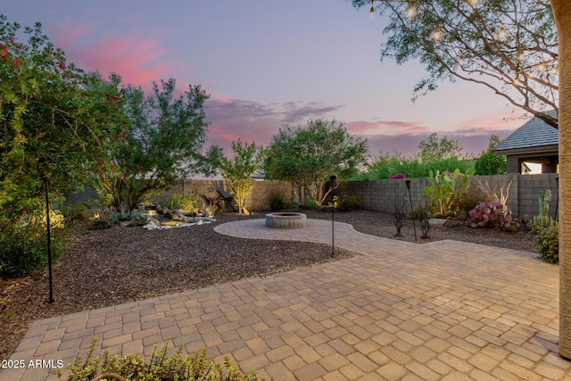 2149 E Aire Libre Ave, Phoenix, AZ 85022 - fenced backyard featuring a patio area and an outdoor fire pit