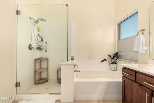 2149 E Aire Libre Ave, Phoenix, AZ 85022 - bathroom featuring vanity, a shower stall, and a garden tub