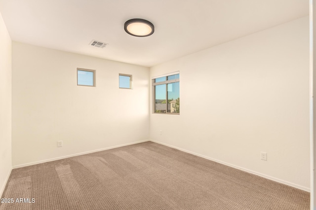 2149 E Aire Libre Ave, Phoenix, AZ 85022 - unfurnished room with baseboards and carpet floors