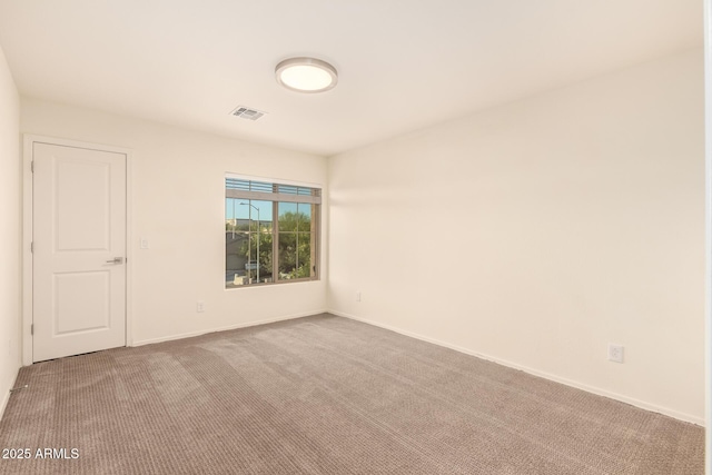 2149 E Aire Libre Ave, Phoenix, AZ 85022 - carpeted empty room with baseboards
