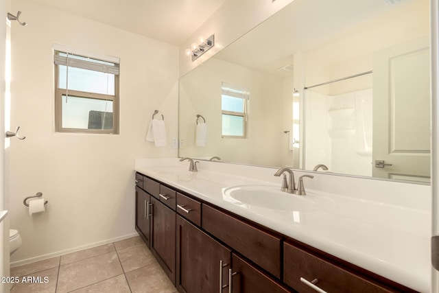 2149 E Aire Libre Ave, Phoenix, AZ 85022 - full bath featuring double vanity, tile patterned flooring, and a shower