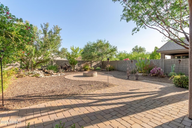 2149 E Aire Libre Ave, Phoenix, AZ 85022 - fenced backyard featuring a patio area and an outdoor fire pit