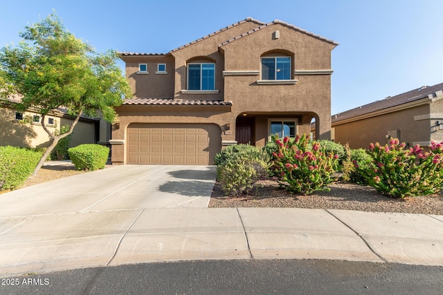 2149 E Aire Libre Ave, Phoenix, AZ 85022 - mediterranean / spanish-style home with a tiled roof, stucco siding, a garage, and driveway