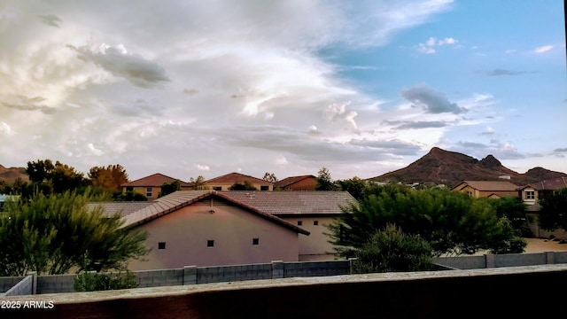 2149 E Aire Libre Ave, Phoenix, AZ 85022 - view of side of property featuring a tiled roof, stucco siding, and a mountain view