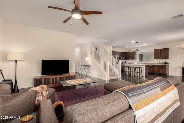 2149 E Aire Libre Ave, Phoenix, AZ 85022 - living area featuring ceiling fan, stairs, and recessed lighting