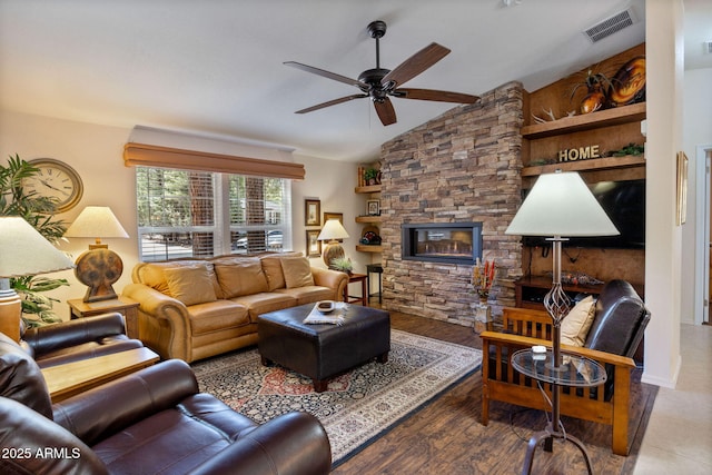 2080 W Pine Grove Dr, Show Low, AZ 85901 - living room with a ceiling fan, vaulted ceiling, a stone fireplace, and wood finished floors