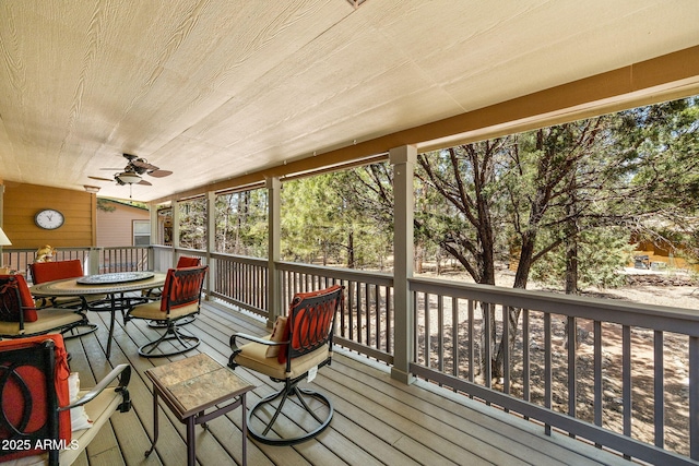 2080 W Pine Grove Dr, Show Low, AZ 85901 - deck with outdoor dining area and a ceiling fan