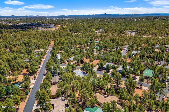 2080 W Pine Grove Dr, Show Low, AZ 85901 - aerial overview of property's location featuring a forest and mountains