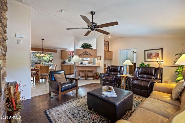 2080 W Pine Grove Dr, Show Low, AZ 85901 - living room with lofted ceiling, light wood-style flooring, a ceiling fan, and a chandelier