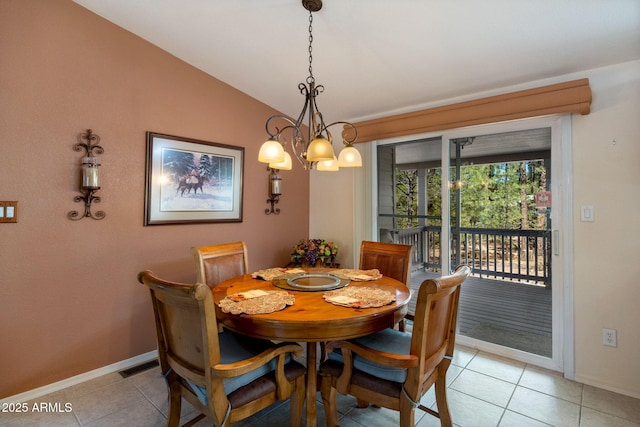 2080 W Pine Grove Dr, Show Low, AZ 85901 - dining area with light tile patterned floors, lofted ceiling, and a chandelier