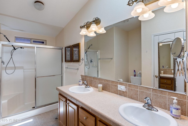 2080 W Pine Grove Dr, Show Low, AZ 85901 - full bathroom featuring lofted ceiling, a shower stall, decorative backsplash, double vanity, and tile patterned flooring