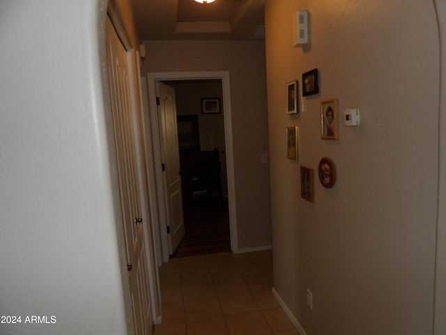 hallway featuring light tile patterned flooring