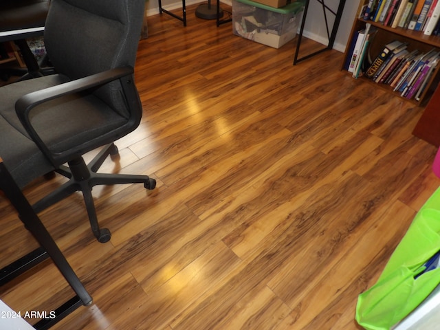 office area with wood-type flooring