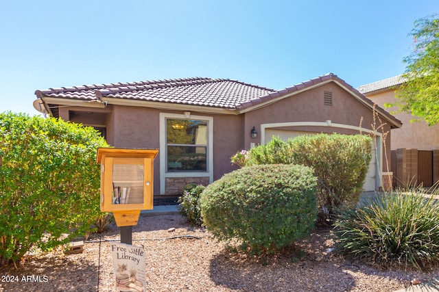 view of front of home featuring a garage