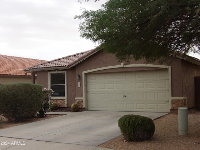 single story home with a garage