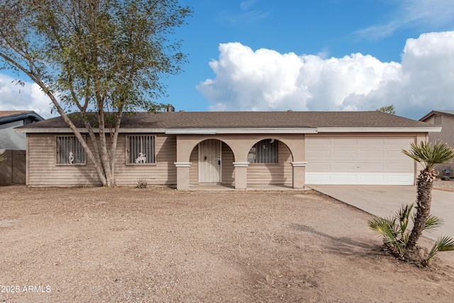 single story home with a garage