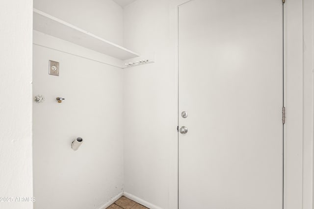 washroom featuring tile patterned floors and hookup for an electric dryer