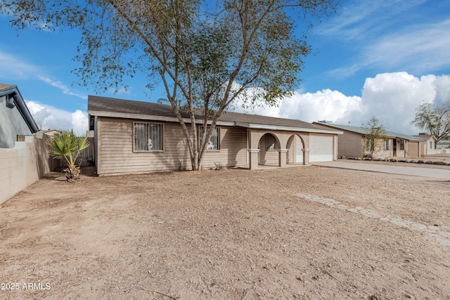 single story home featuring a garage