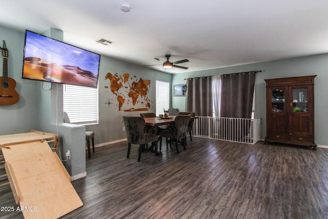 13709 W Rovey Ave, Litchfield Park, AZ 85340 - dining room featuring wood finished floors, ceiling fan, healthy amount of natural light, and baseboards