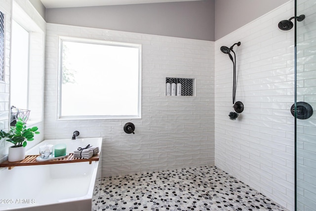 13709 W Rovey Ave, Litchfield Park, AZ 85340 - full bathroom with tiled shower and a freestanding bath