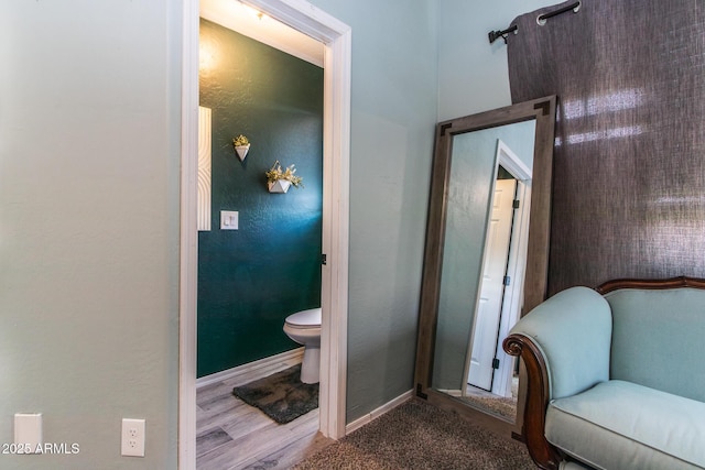 13709 W Rovey Ave, Litchfield Park, AZ 85340 - bathroom with toilet, baseboards, and wood finished floors