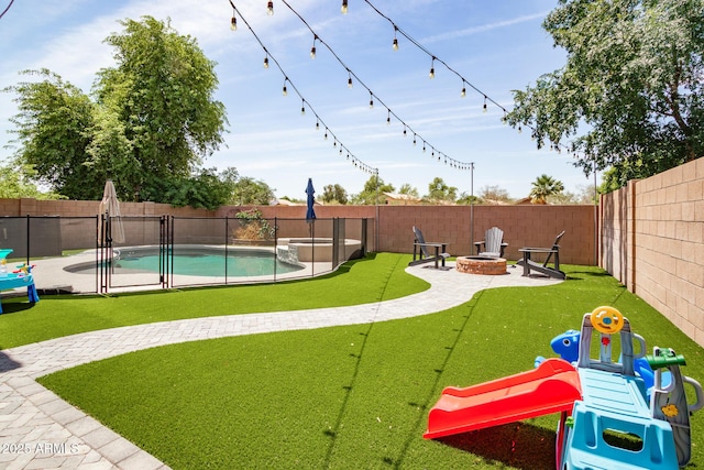 13709 W Rovey Ave, Litchfield Park, AZ 85340 - view of yard with an outdoor fire pit, a pool with connected hot tub, and a patio area