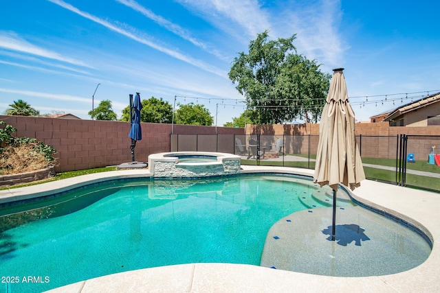 13709 W Rovey Ave, Litchfield Park, AZ 85340 - view of pool with a fenced backyard, a patio, and a pool with connected hot tub