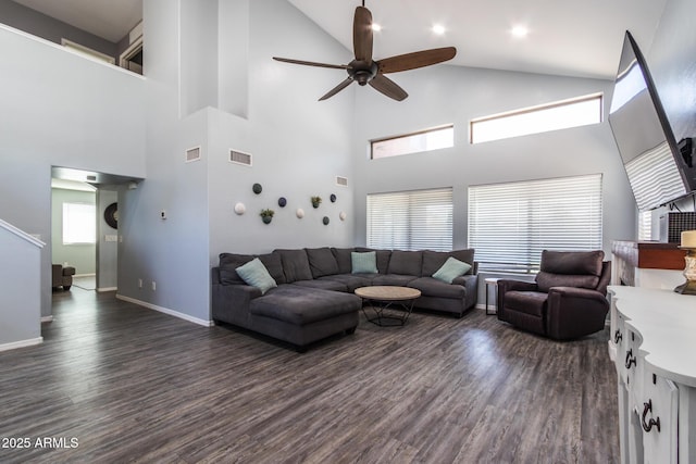 13709 W Rovey Ave, Litchfield Park, AZ 85340 - living area with a ceiling fan, high vaulted ceiling, dark wood finished floors, and baseboards