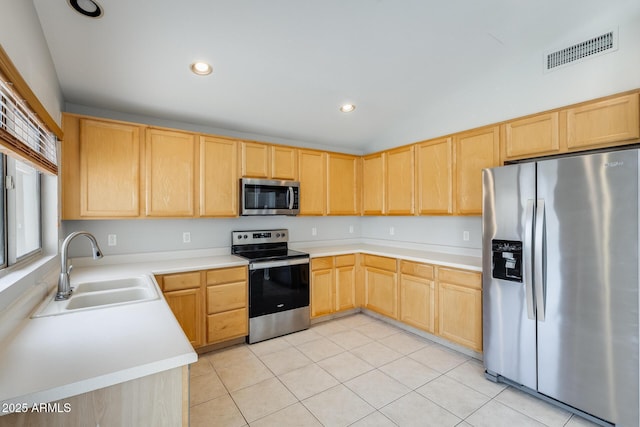 1037 E Baylor Ln, Gilbert, AZ 85296 - kitchen with appliances with stainless steel finishes, light brown cabinets, light countertops, light tile patterned flooring, and recessed lighting