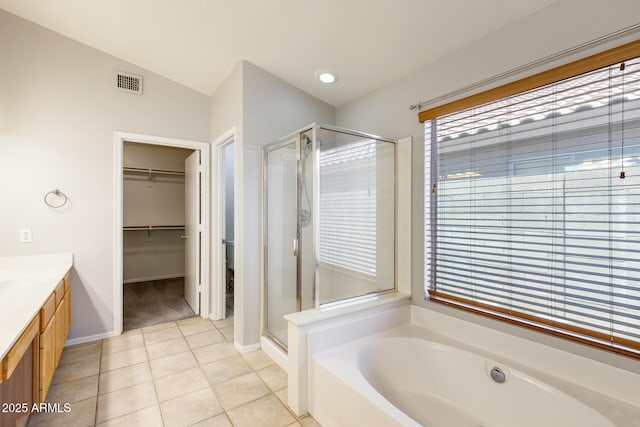 1037 E Baylor Ln, Gilbert, AZ 85296 - bathroom with a stall shower, a bath, vanity, and tile patterned floors