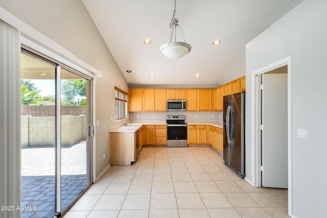1037 E Baylor Ln, Gilbert, AZ 85296 - kitchen featuring appliances with stainless steel finishes, light countertops, light brown cabinets, recessed lighting, and light tile patterned floors