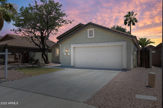 1037 E Baylor Ln, Gilbert, AZ 85296 - ranch-style home featuring stucco siding, concrete driveway, a tile roof, and a garage