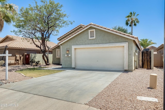 1037 E Baylor Ln, Gilbert, AZ 85296 - ranch-style home with stucco siding, driveway, an attached garage, a gate, and a tiled roof