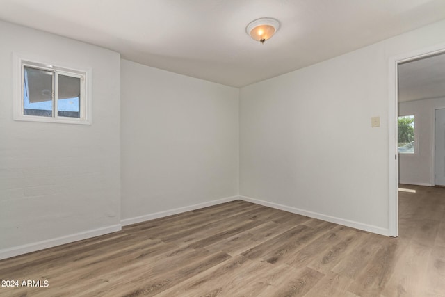 spare room featuring hardwood / wood-style flooring