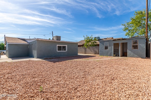 back of property featuring a patio area