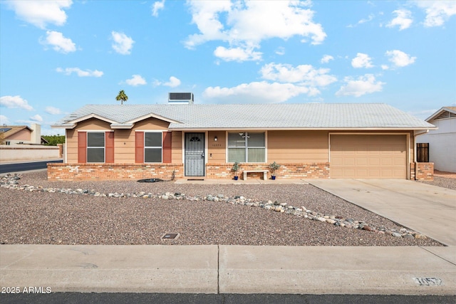 ranch-style home with a garage