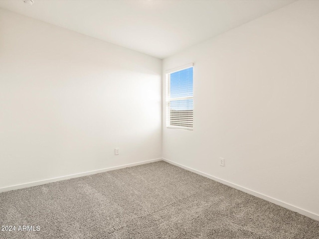 empty room featuring carpet flooring