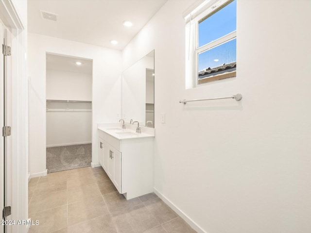 bathroom featuring vanity and tile patterned floors